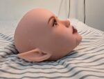 Vesper pre-owned TPE fantasy head, side profile with small chin blemish